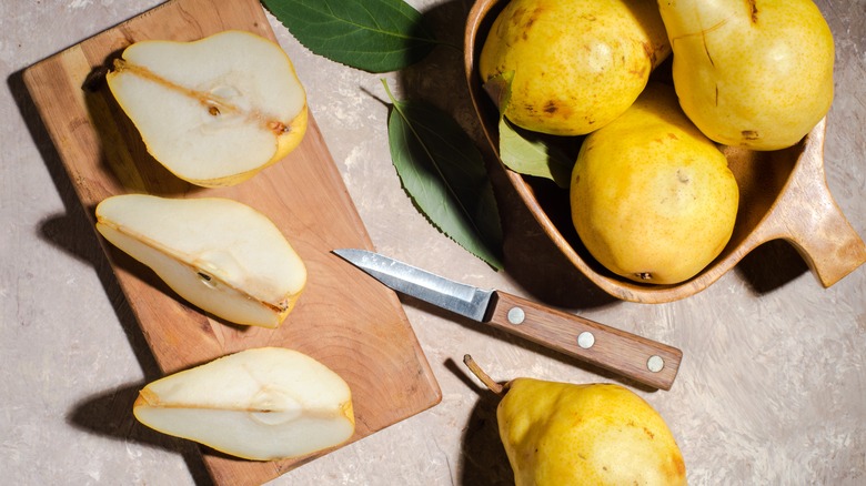 pear cores with knife