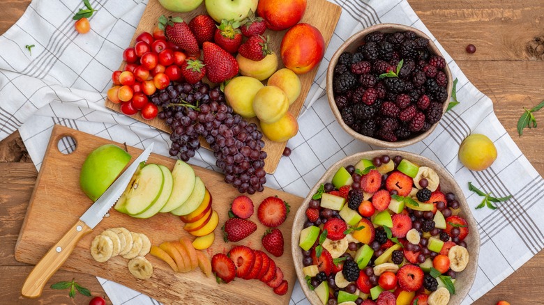 Assorted fruits on cutting board