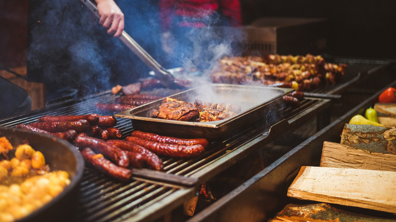 wood grill with meats