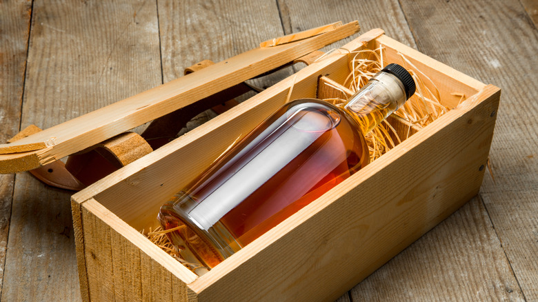 whiskey bottles pictured on tabletop