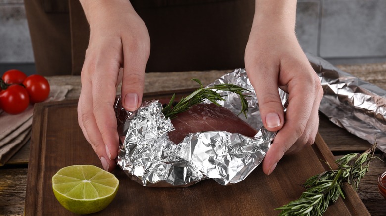 wrapping meat with foil