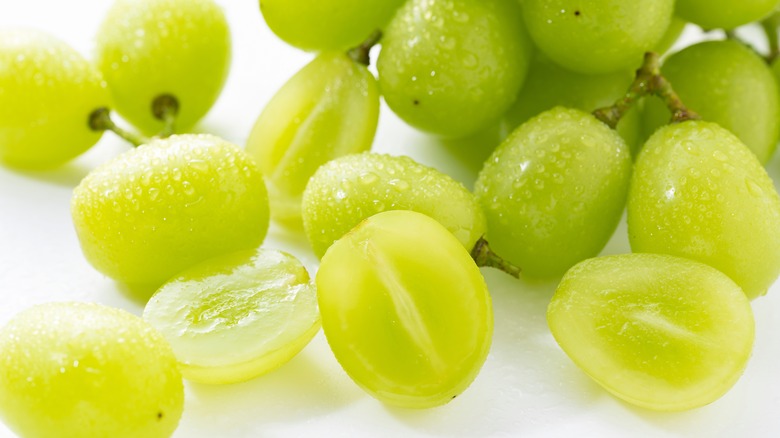 Shine Muscat grapes against white