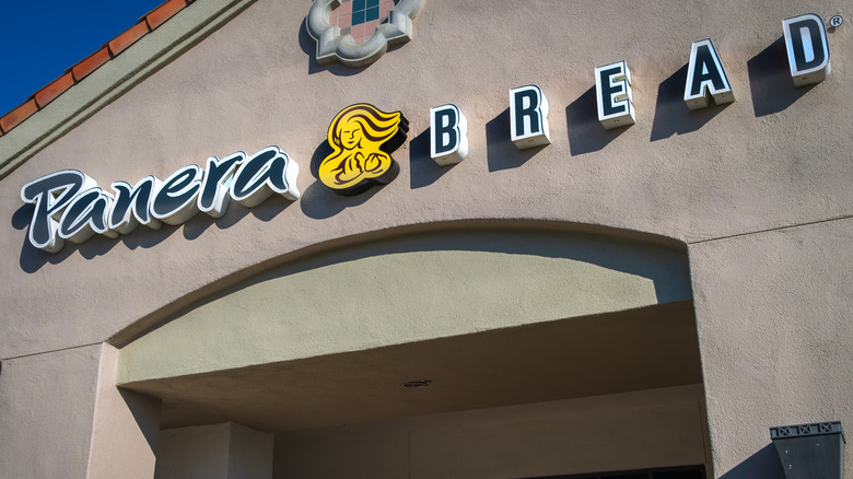 Panera Bread store front with the new logo prominent.