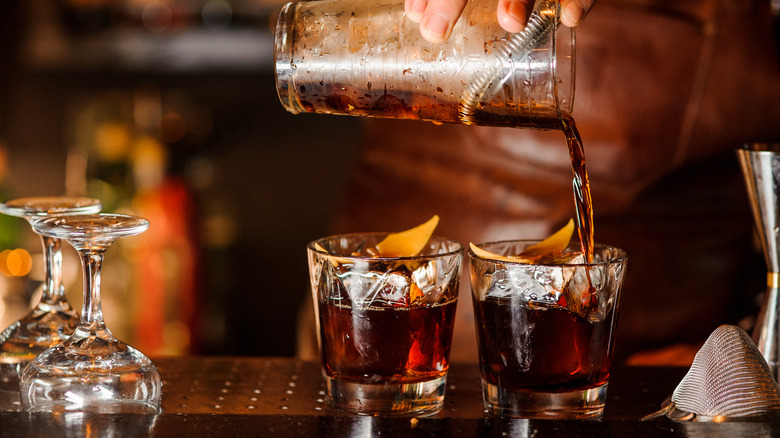 Bartender pouring drinks