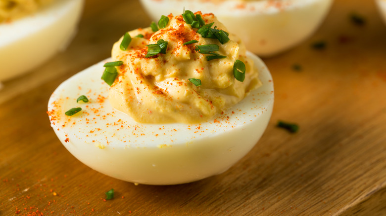 deviled egg topped with chives