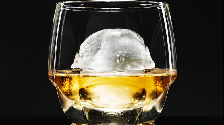 Whiskey with large ice cube