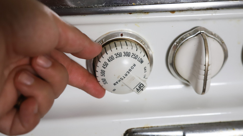 Hand turning oven dial