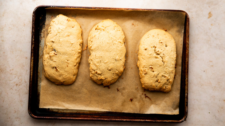 Baked cookie logs on tray