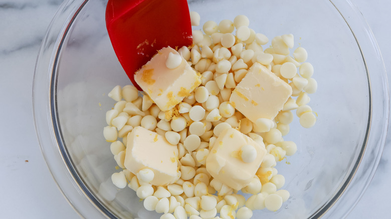 chocolate, butter, and lemon in glass bowl