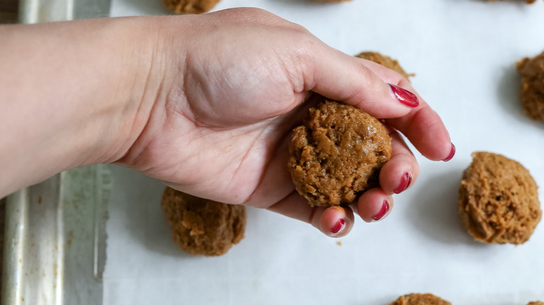 pumpkin spice truffle batter being rolled into balls