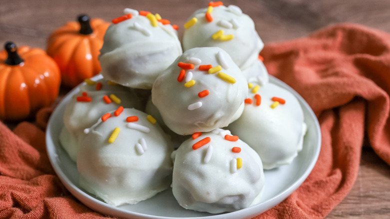 white chocolate pumpkin spice truffles on a plate