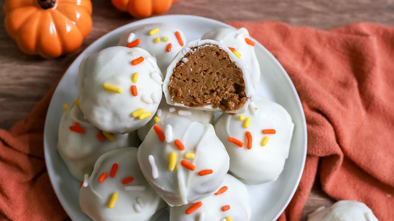 white chocolate pumpkin spice truffles on a plate