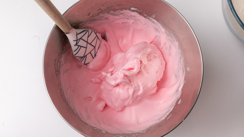 Pink meringue batter in bowl 