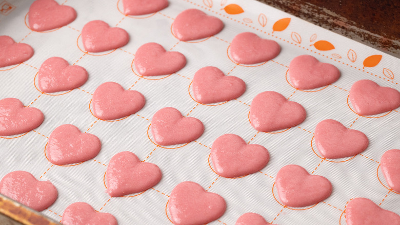 Piped macarons ready to bake