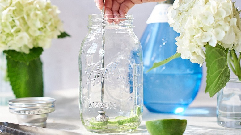 muddling cucumbers in shaker