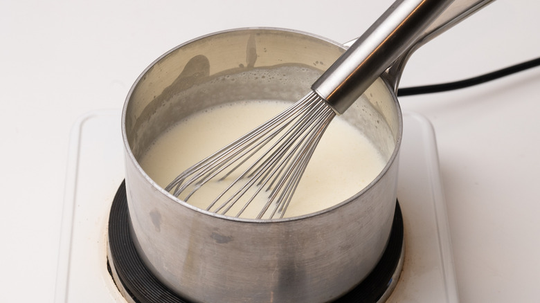 white sauce in a saucepan