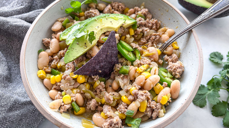 white turkey chili with garnishes