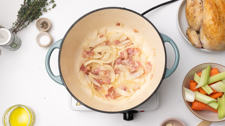 Sauteing bacon and onion in pot