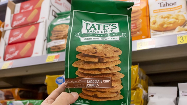 hand holding Tate's Bake Shop cookies