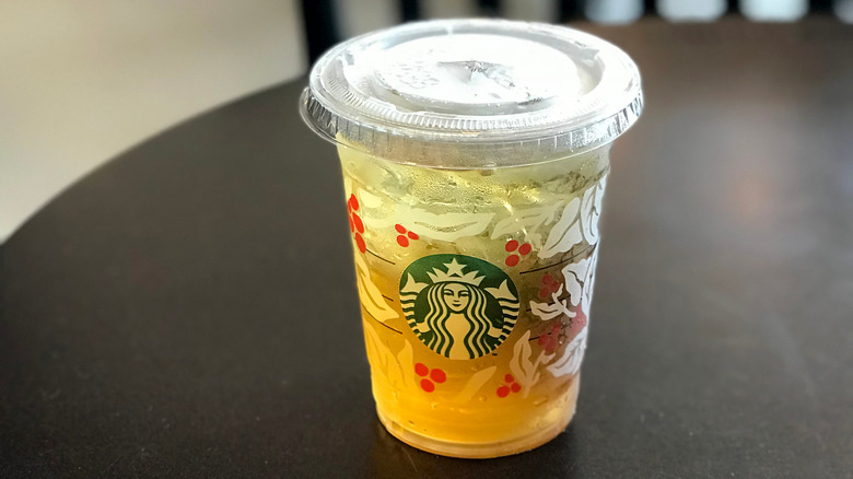 cup of starbucks apple juice