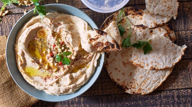 Overview of Trader Joe's Mediterranean Hummus with pita bread