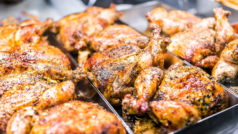 Trays of cooked chicken