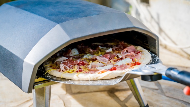 Cooking raw pizza in oven