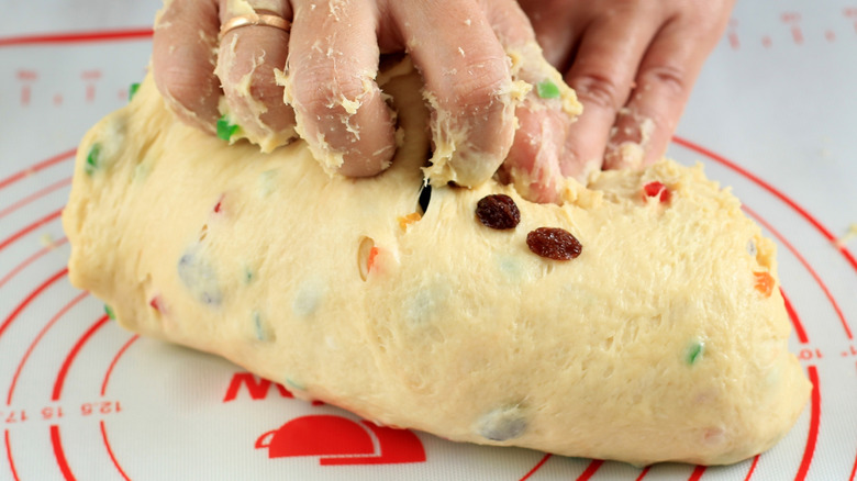 Kneading sticky fresh panettone dough at home