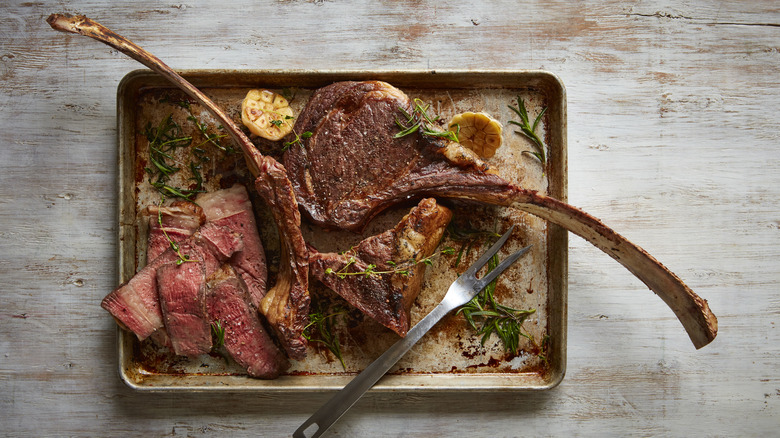 An overhead photo of tomahawk steaks