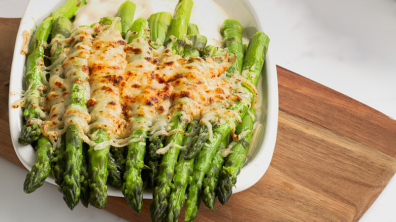 asparagus covered in cheese