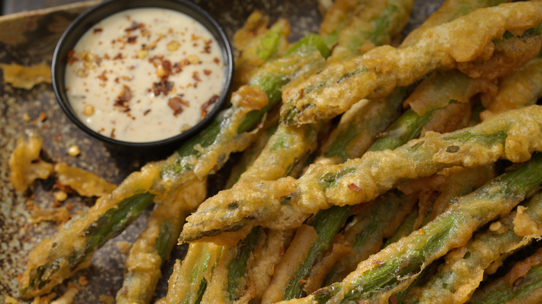 battered asparagus with sauce