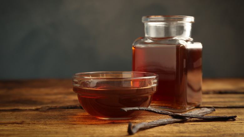 containers filled with vanilla and bourbon