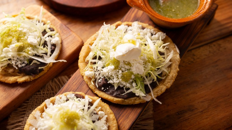 Mexican sopes with crema and cotija