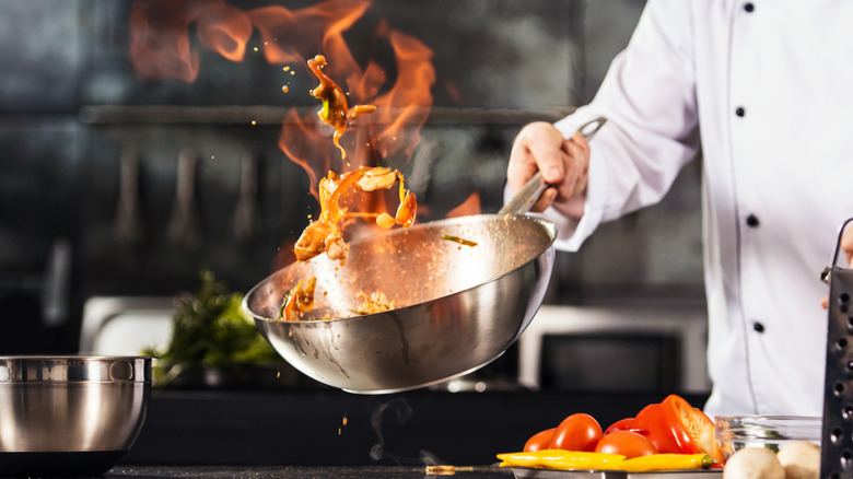 A chef working in a restaurant kitchen