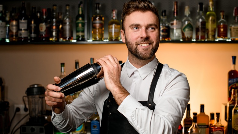 Man holding a cocktail shaker