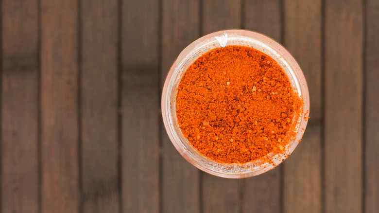 container of sriracha powder aerial view