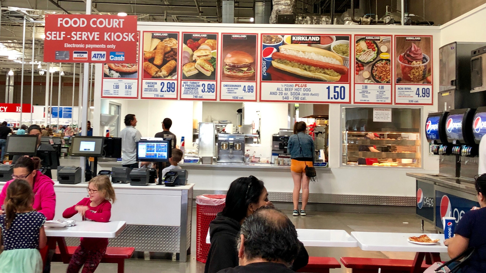 Why did Costco stop selling cheeseburgers in its food courts?