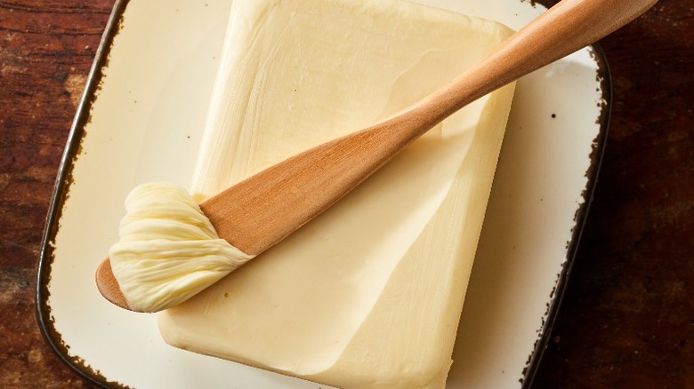 Butter block with wooden spreader