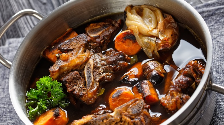 Braised beef cooking in pot