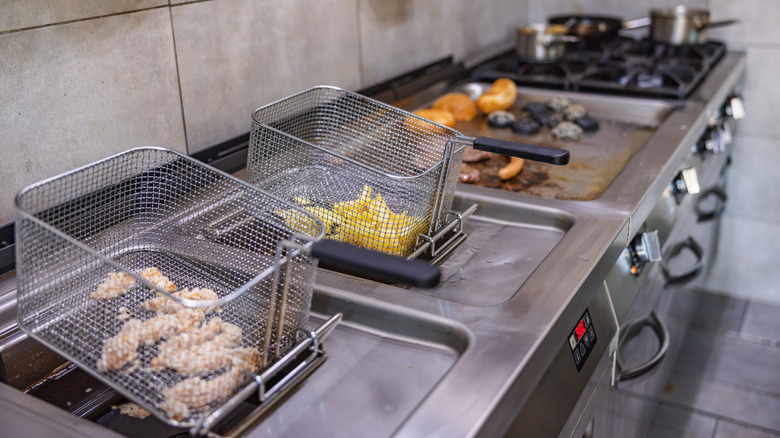 Industrial kitchen fryers, flat top, and burners