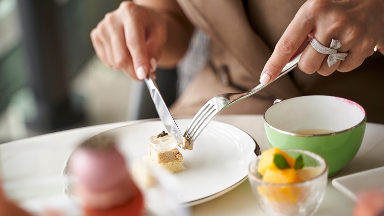 Using a fork to eat