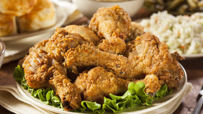 crispy fried chicken piled atop a platter