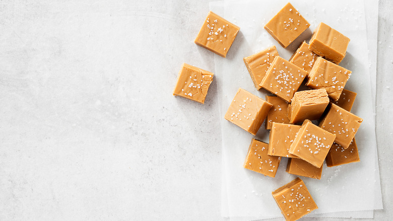 Salted caramel fudge on parchment paper