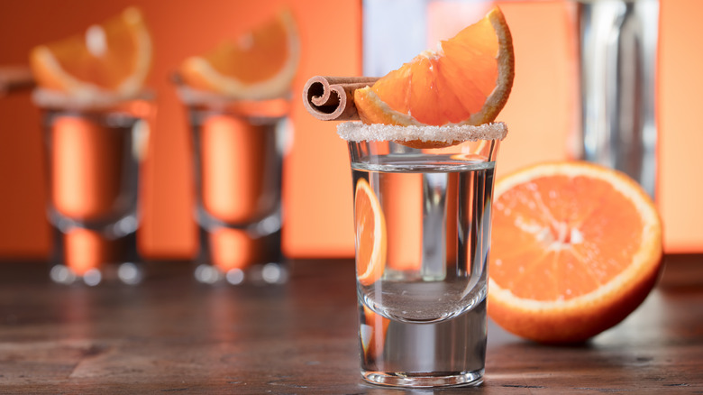 grapefruit and cinnamon on shot glass