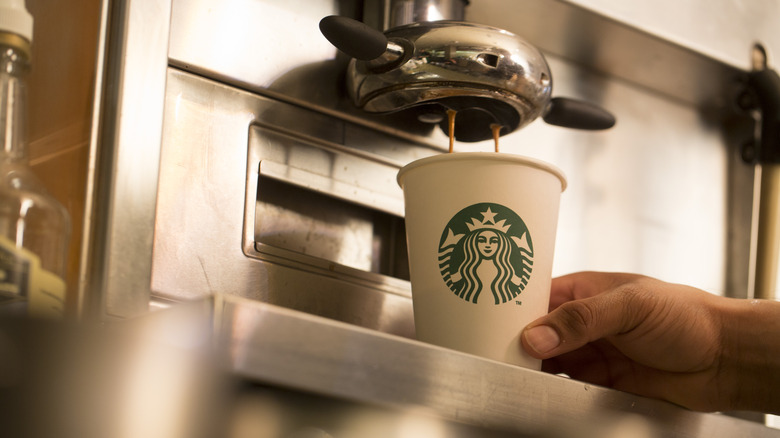 Coffee pouring into cup at Starbucks