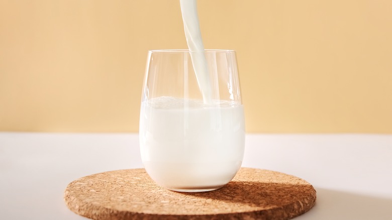 Pouring milk into glass