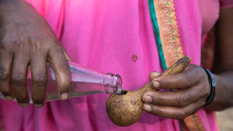 traditional serving of mahua liquor