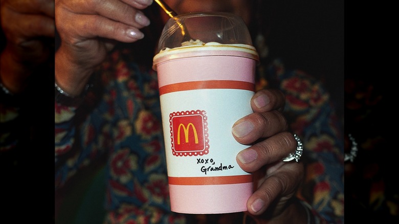 Hands holding McDonald's Grandma McFlurry