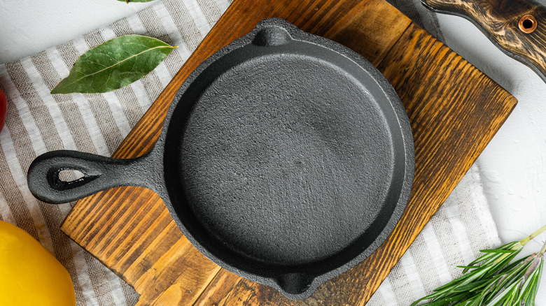 cast iron skillet on board