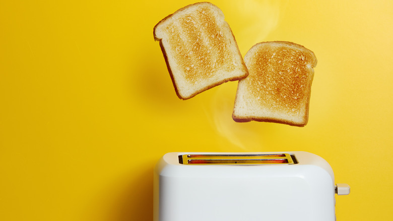 Bread popping out of toaster